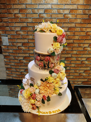 Two-tier floral designer cake by Mr. Jain Bakery